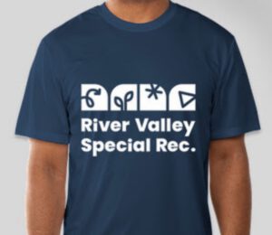 Close up view of a navy blue tee shirt with the River Vally Special Rec logo printed across the chest.